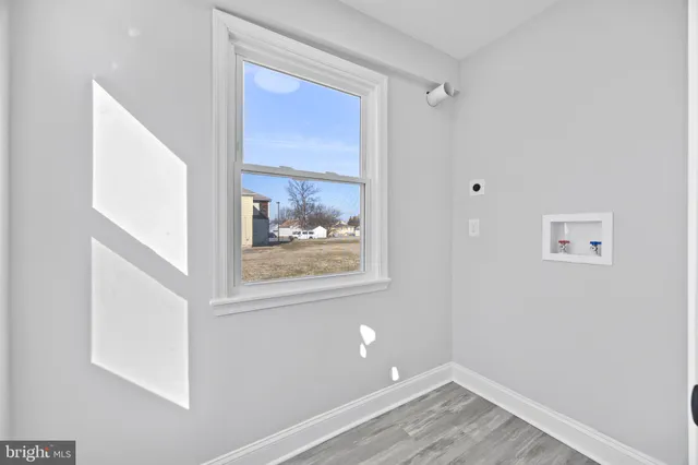 a view of a hallway with closet