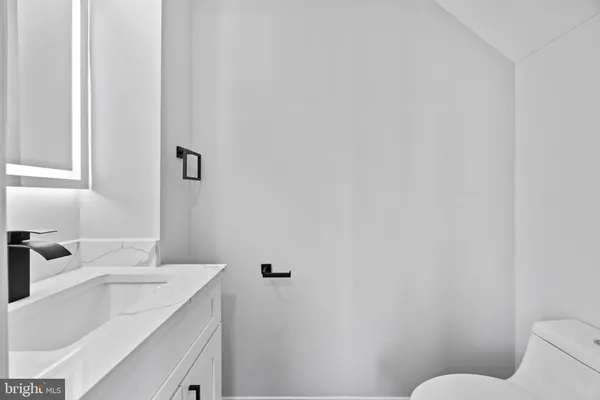 a bathroom with a sink and a toilet