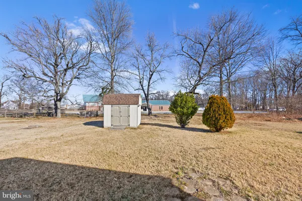 a view of a white house with a snow