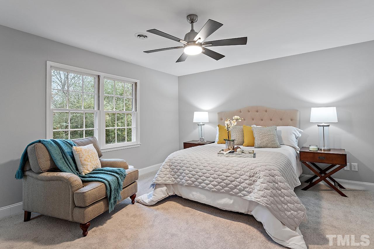 2800 Pidgeon Hill Road Raleigh, NC 27613 - Photo 18 of 35 a bedroom with a bed and window