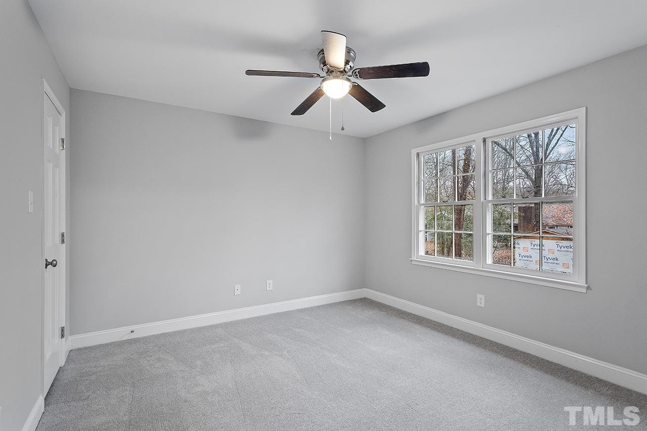 2800 Pidgeon Hill Road Raleigh, NC 27613 - Photo 19 of 35 an empty room with a window