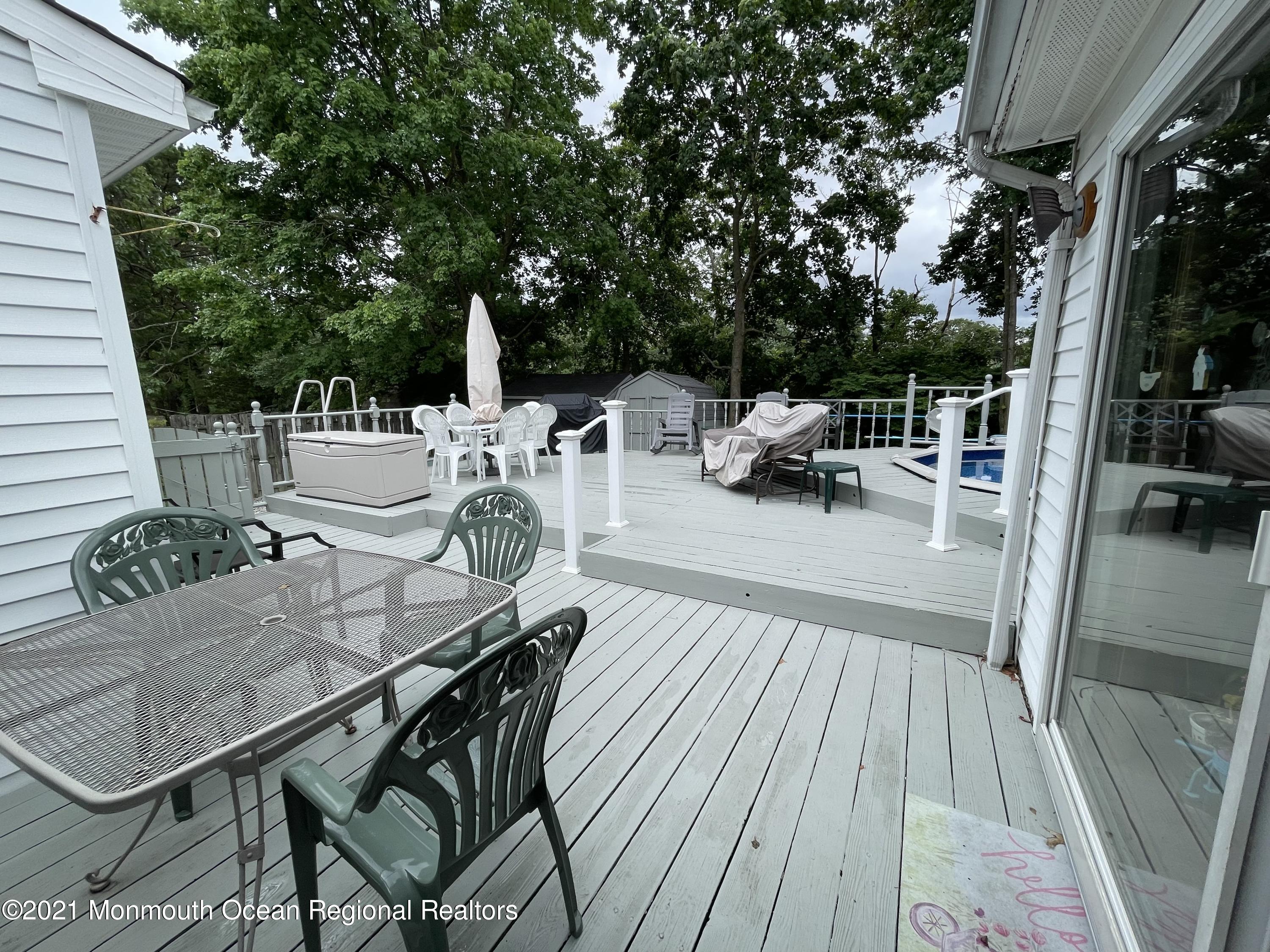 84 Club House Road Brick, NJ 08723 - Photo 22 of 28 a deck view with a seating space