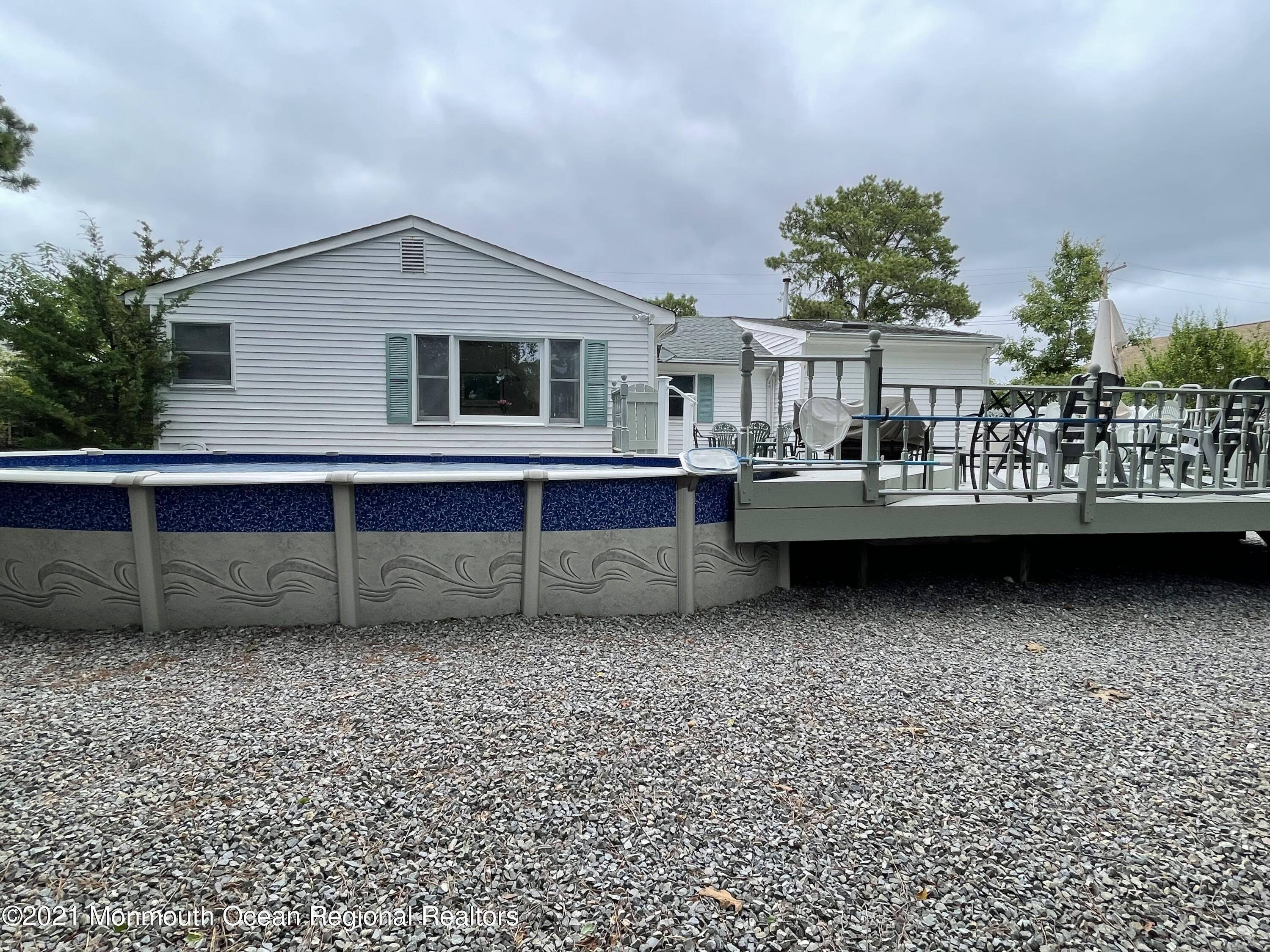 84 Club House Road Brick, NJ 08723 - Photo 25 of 28 a view of a house with a yard