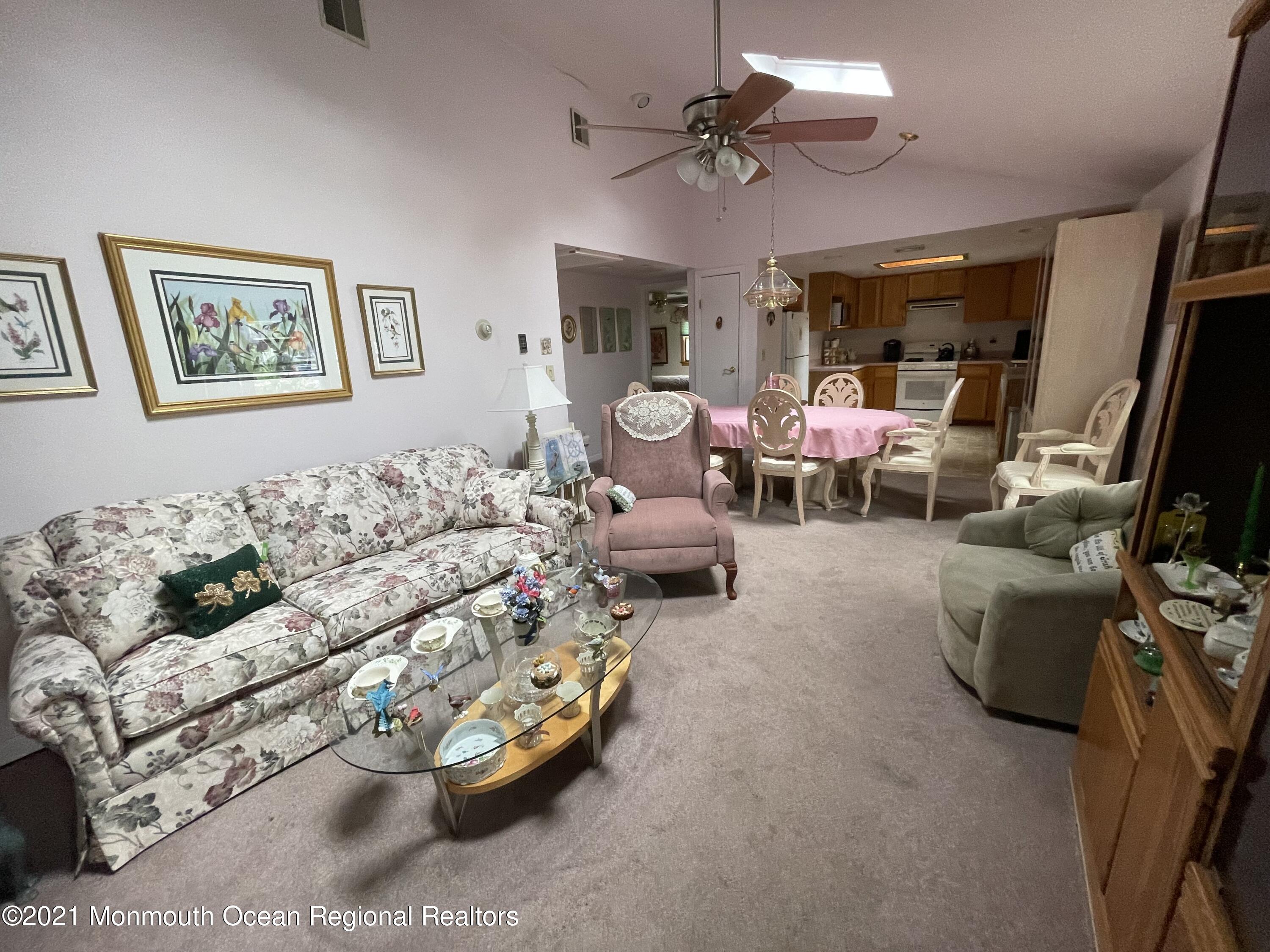 84 Club House Road Brick, NJ 08723 - Photo 7 of 28 a living room with furniture and a flat screen tv