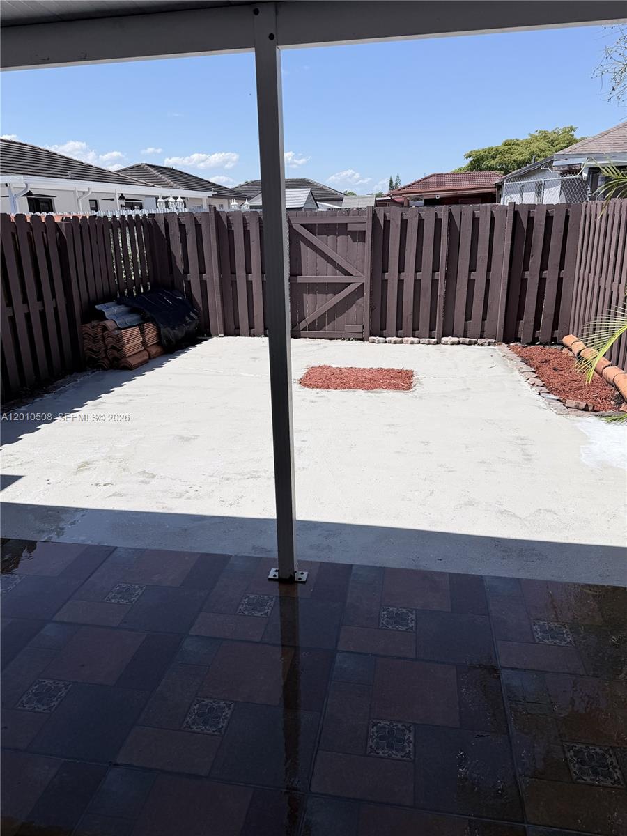 14775 Southwest 83rd Lane, Unit 14775 Miami, FL 33193 - Photo 24 of 26 view from covered patio to open deck