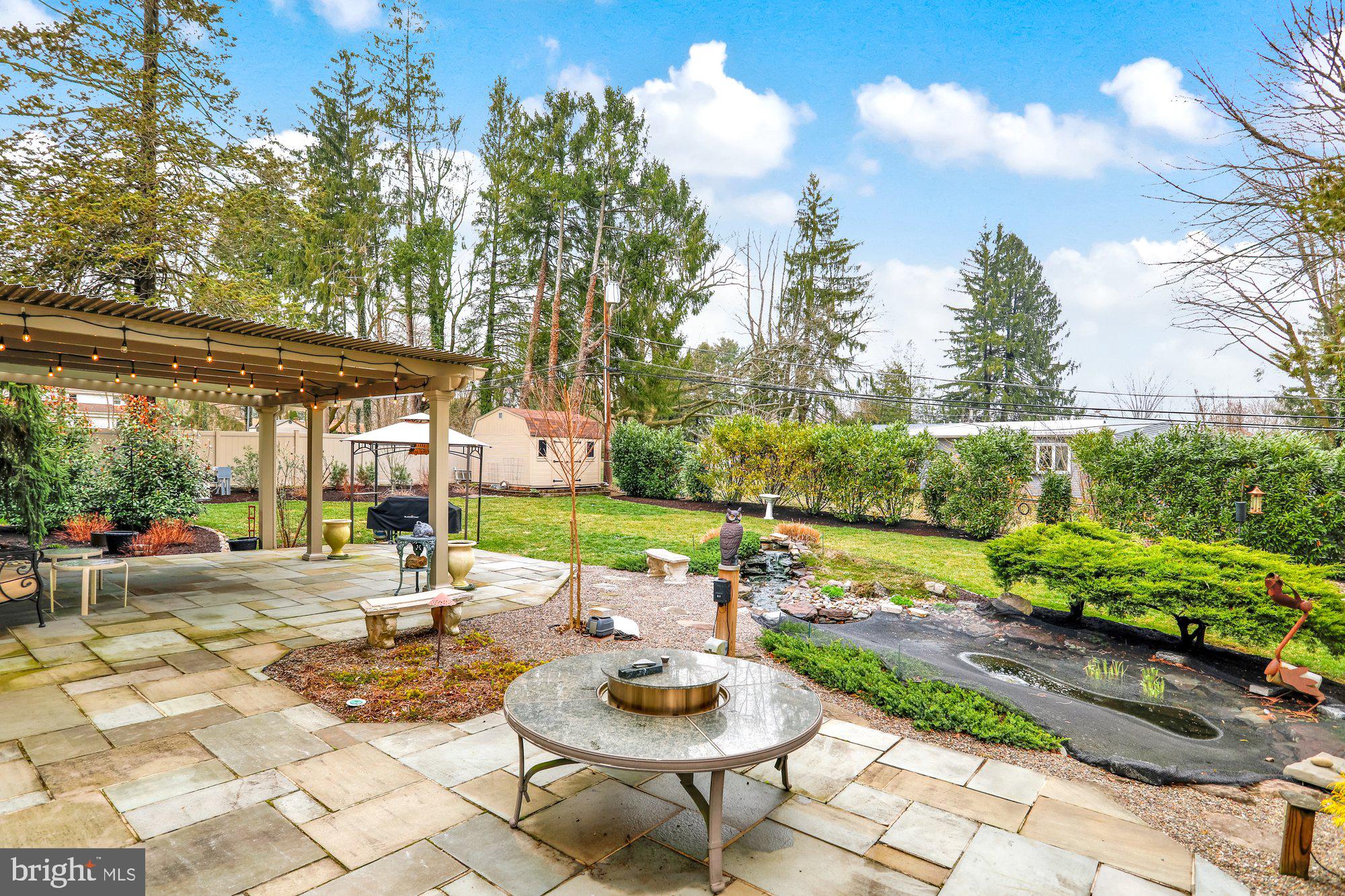 1324 Michael Road Jenkintown, PA 19046 - Photo 35 of 39 Back patio and fish pond