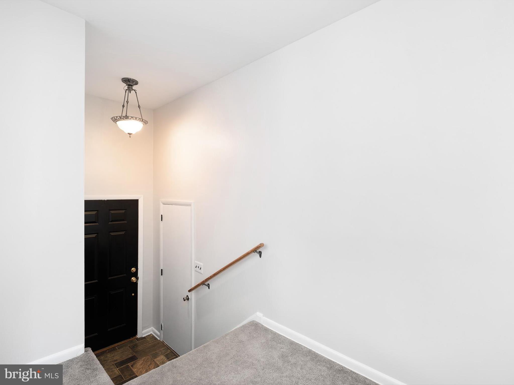 2114 Wrexham Road Wilmington, DE 19810 - Photo 3 of 27 Foyer entrance and door to garage