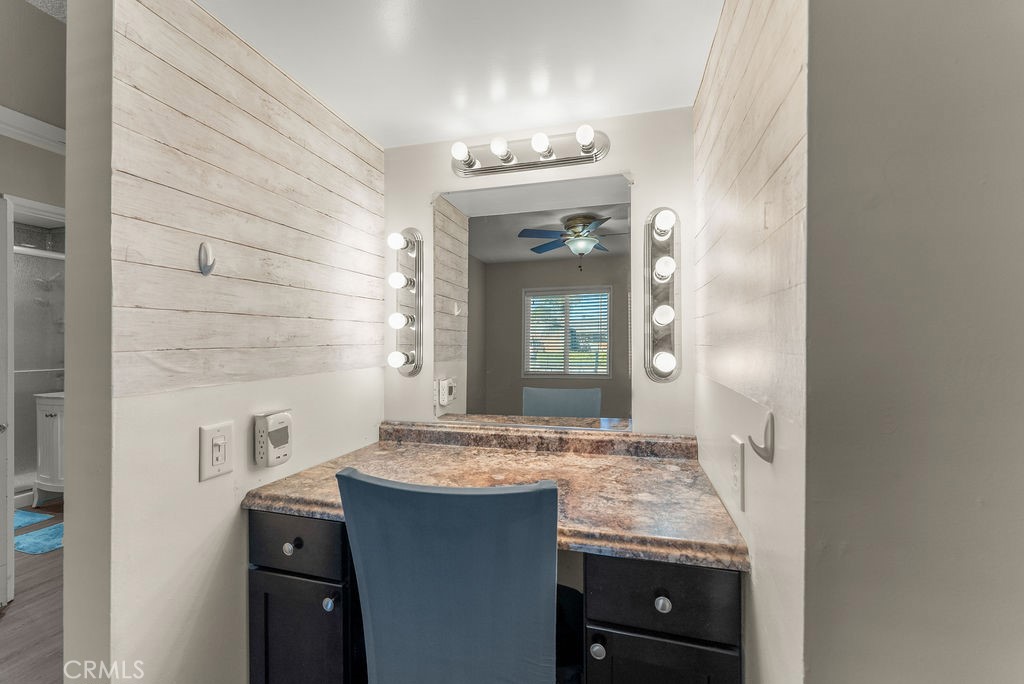 3540 Cannes Avenue Riverside, CA 92501 - Photo 20 of 32 a bathroom with a sink and a mirror