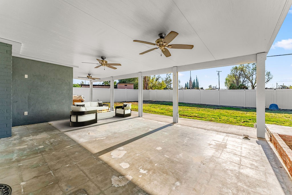 3540 Cannes Avenue Riverside, CA 92501 - Photo 25 of 32 a view of a living room and kitchen