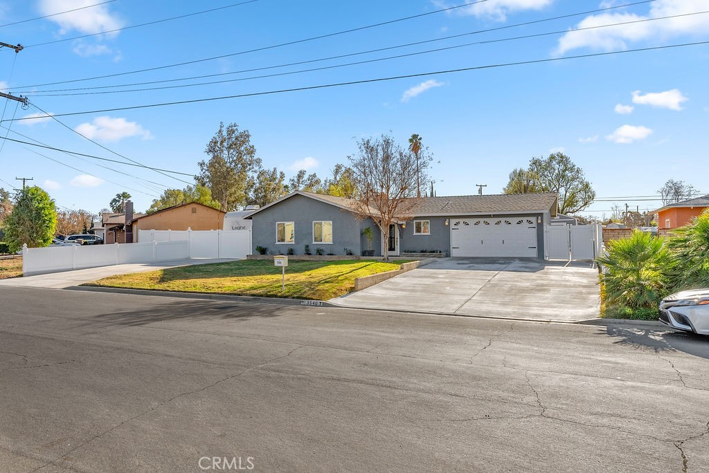 3540 Cannes Avenue Riverside, CA 92501 - Photo 3 of 32 a view of a house with swimming pool