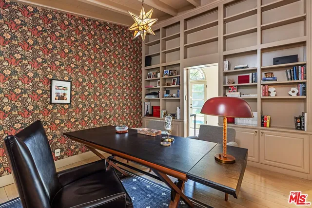 a room with furniture and gym equipment