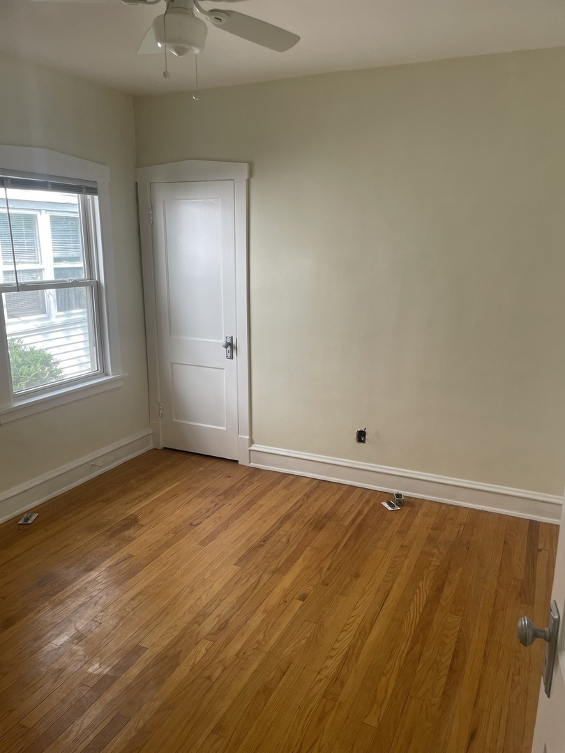 Undisclosed Address Forest Park, IL 60130 - Photo 5 of 16 a view of an empty room and window