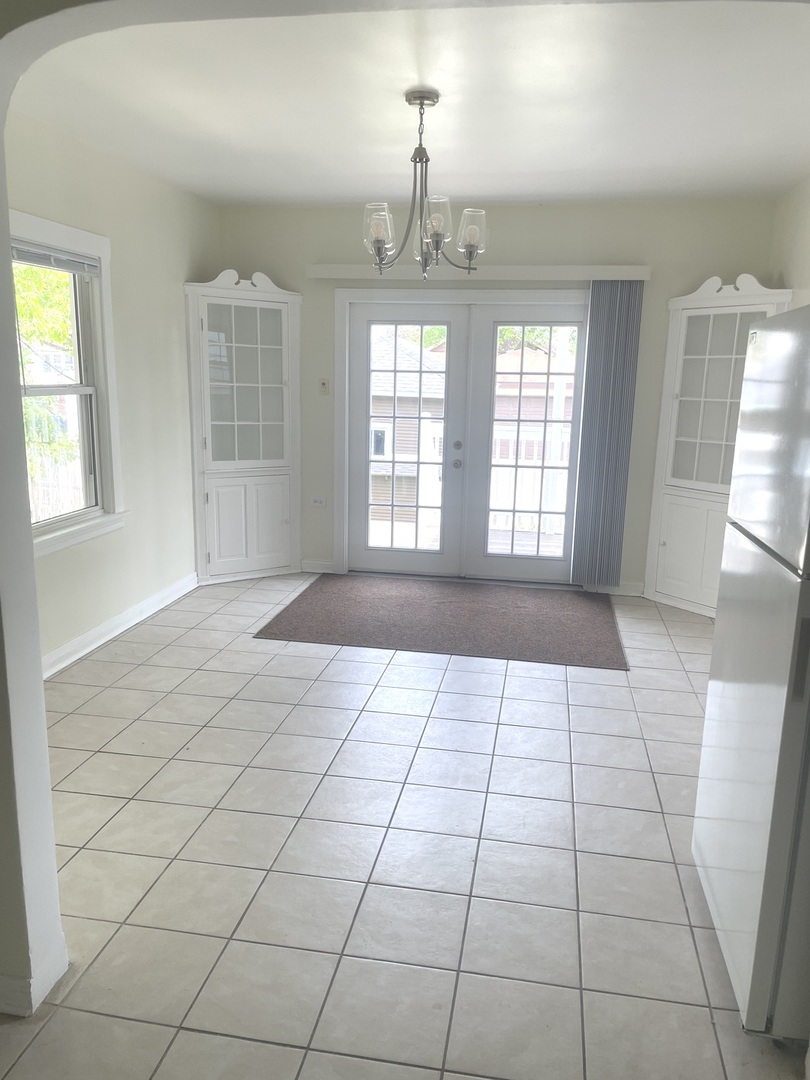 Undisclosed Address Forest Park, IL 60130 - Photo 7 of 16 a view of an empty room and window