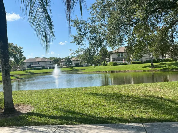 a view of a lake with a building in the background