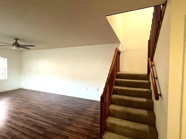 a view of entryway with wooden floor