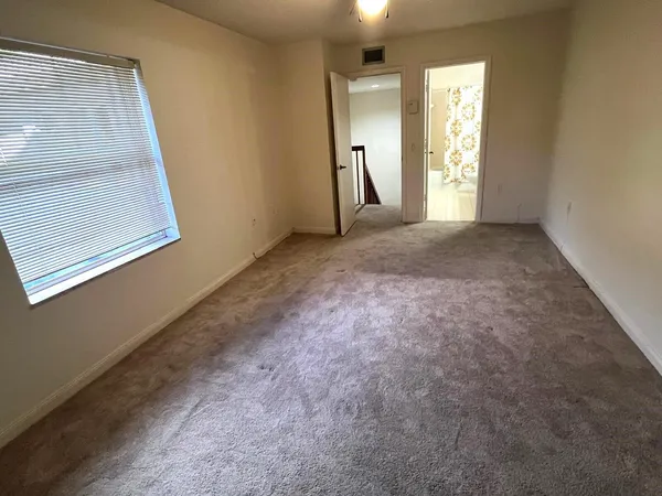 a view of empty room with front door