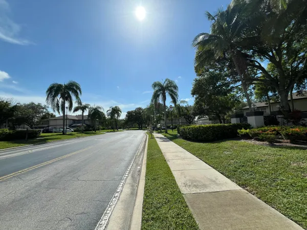 a view of swimming pool with a yard