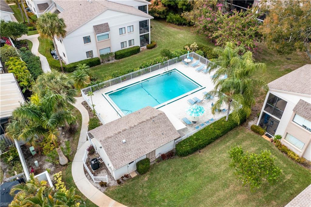 910 Vanderbilt Beach Road, Unit 311W Naples, FL 34108 - Photo 17 of 17 Aerial view of the community pool