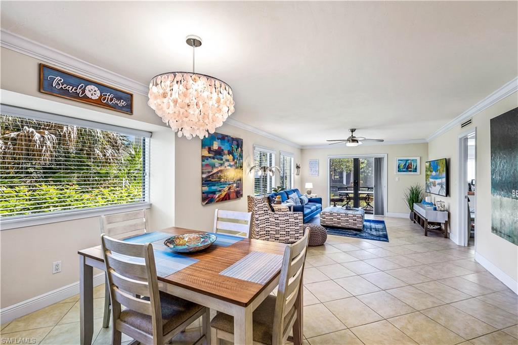 910 Vanderbilt Beach Road, Unit 311W Naples, FL 34108 - Photo 5 of 17 Open concept Dining/Living area with an abundance of natural light