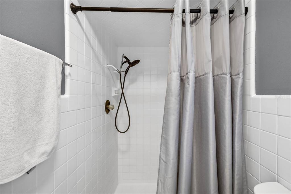 16330 Hanna Road Lutz, FL 33549 - Photo 26 of 41 a bathroom with a shower