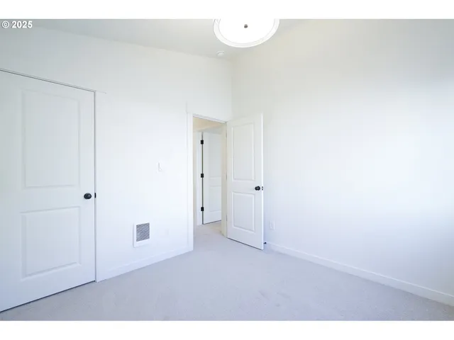 a bathroom with a sink toilet and a mirror