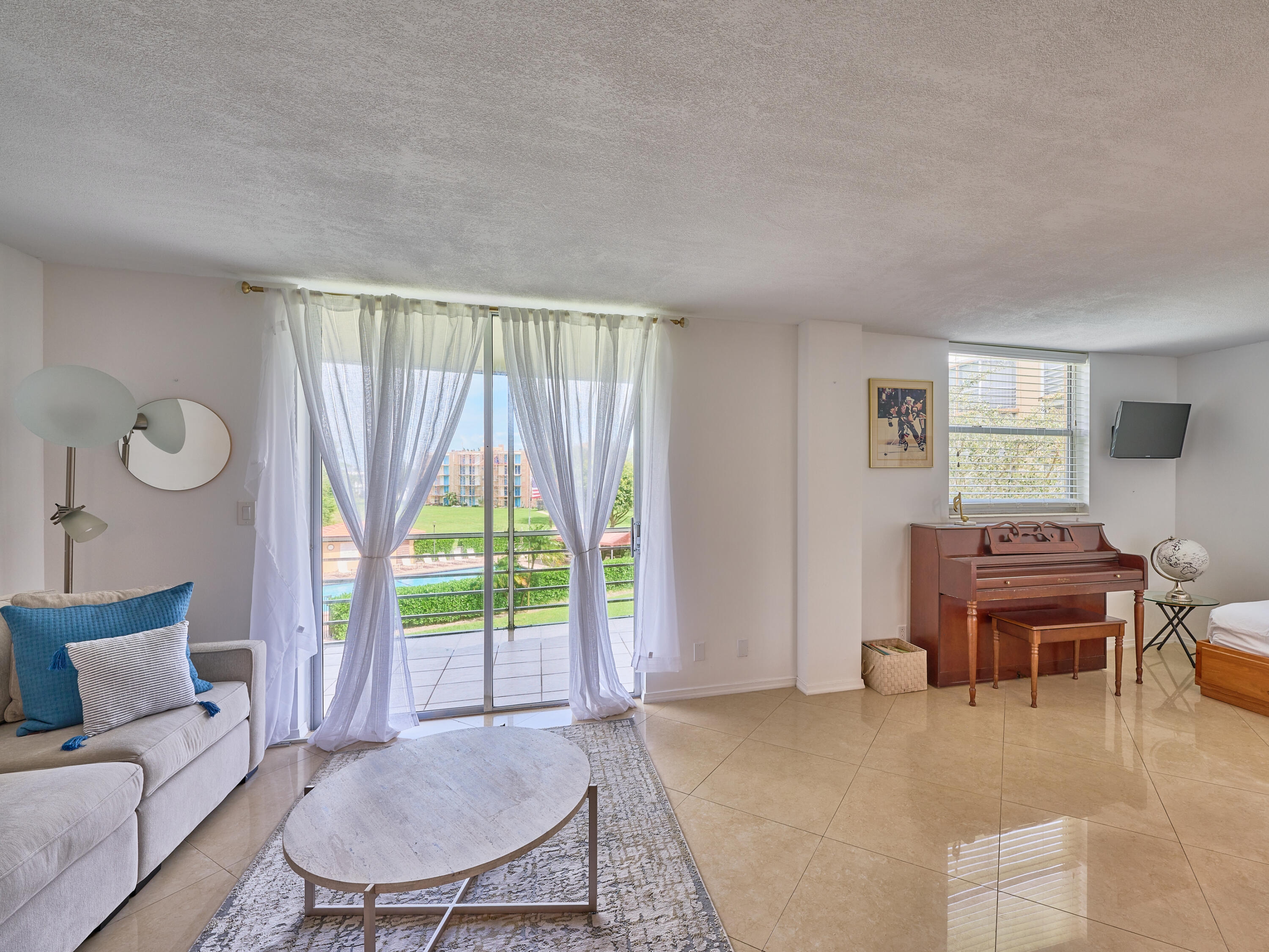 299 Northwest 52nd Terrace, Unit 317 Boca Raton, FL 33487 - Photo 4 of 36 Living room