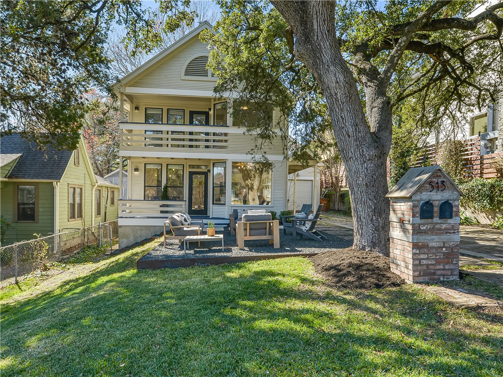 front view of a house with a yard
