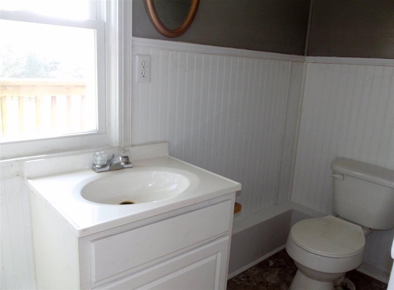 7597 Goods Mill Road Harrisonburg, VA 22801 - Photo 18 of 23 a bathroom with a sink and a toilet