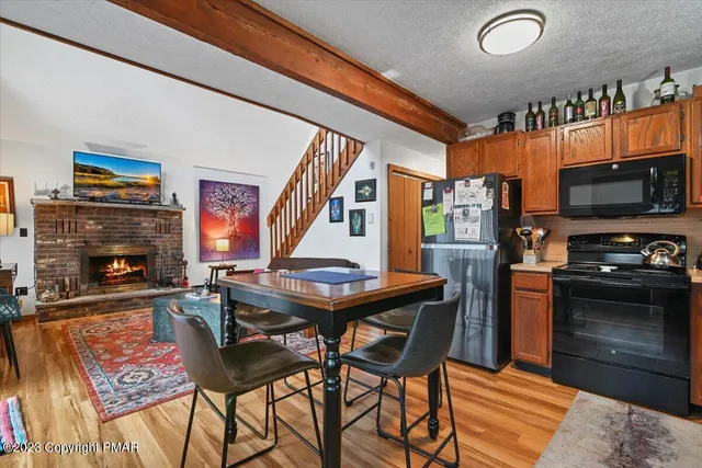 a bedroom with a bed and a television