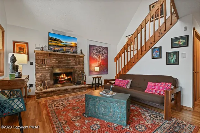 a kitchen with granite countertop a sink stove and cabinets