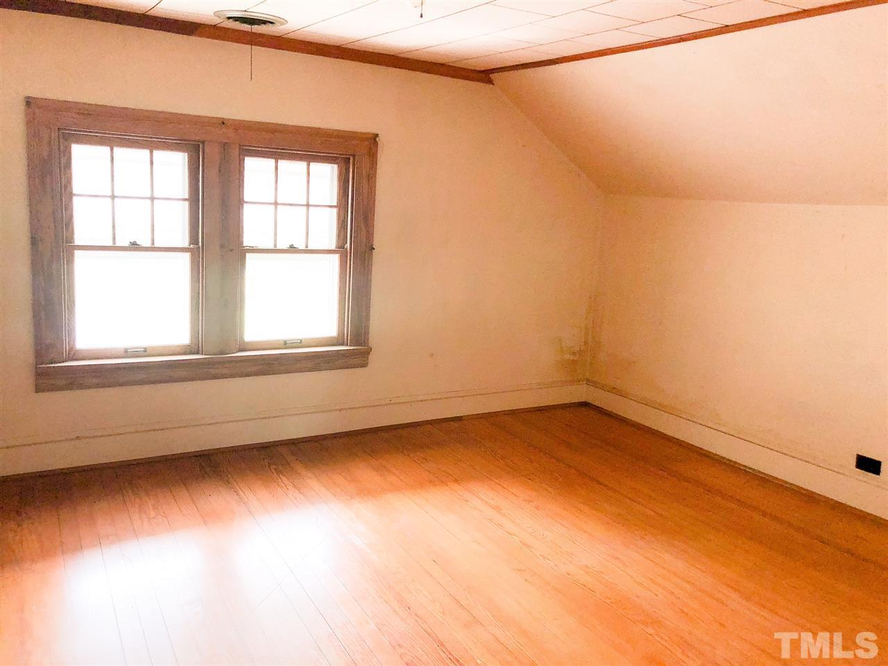 894 Shiloh Church Road Roxboro, NC 27574 - Photo 11 of 24 an empty room with a window