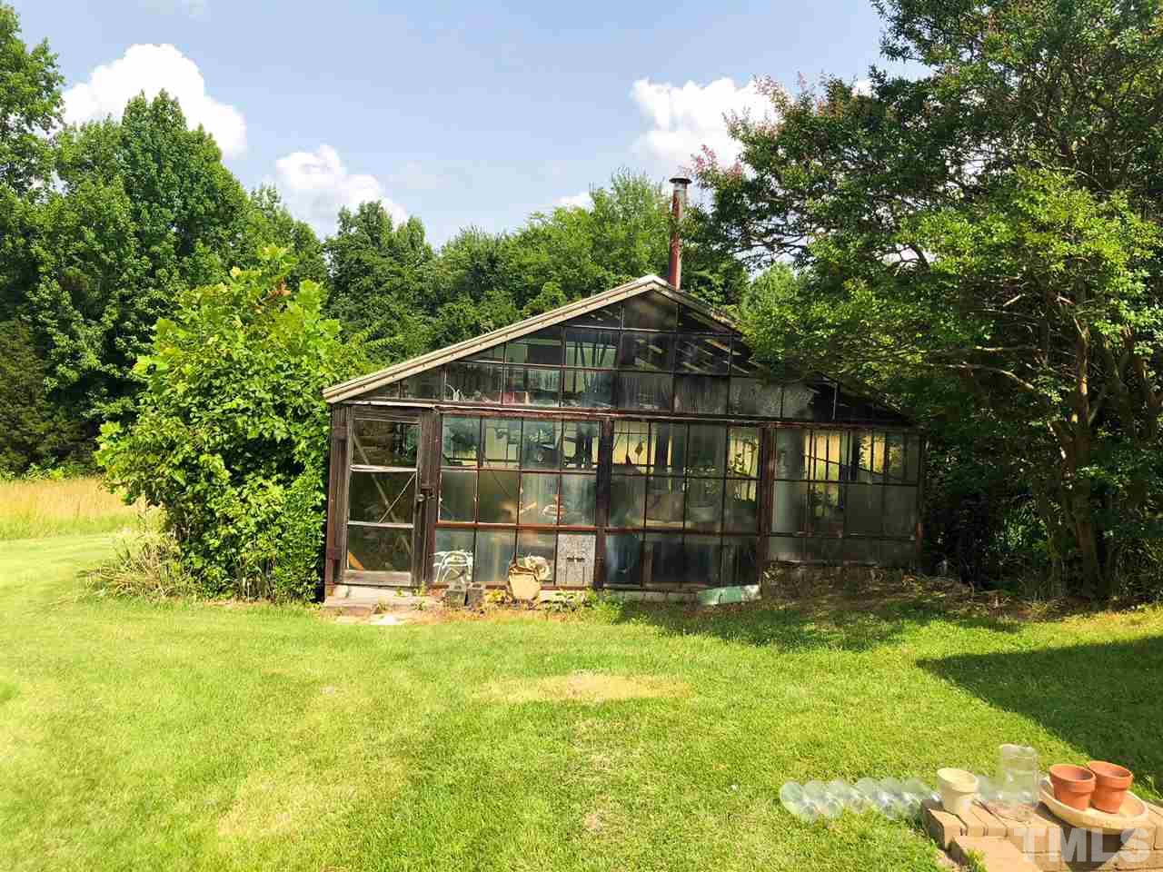 894 Shiloh Church Road Roxboro, NC 27574 - Photo 16 of 24 a view of a house with a yard