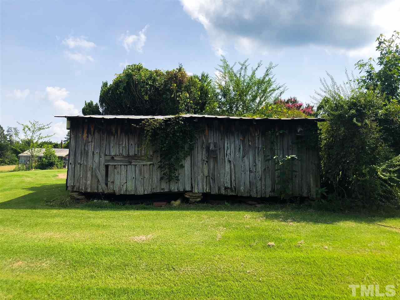 894 Shiloh Church Road Roxboro, NC 27574 - Photo 21 of 24 a view of a small yard