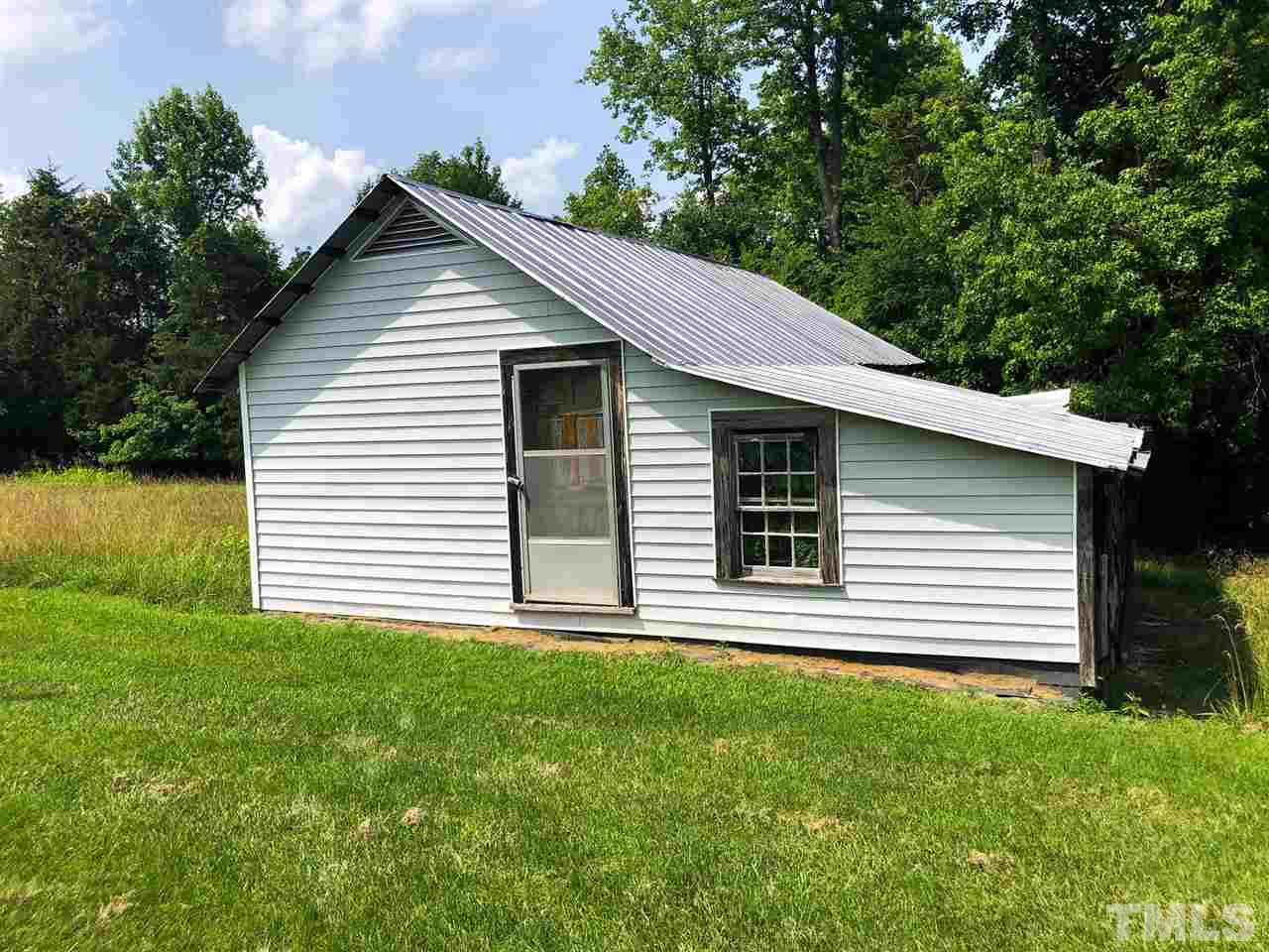 894 Shiloh Church Road Roxboro, NC 27574 - Photo 23 of 24 a front view of a house with a yard