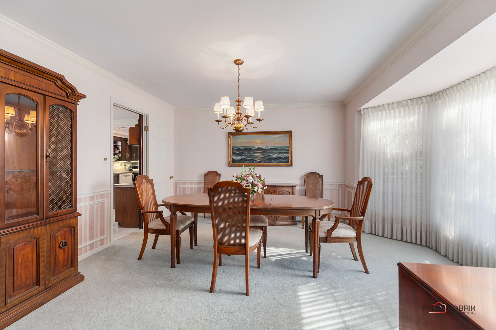 950 Old Mill Road Lake Forest, IL 60045 - Photo 12 of 59 a view of a dining room with furniture and chandelier