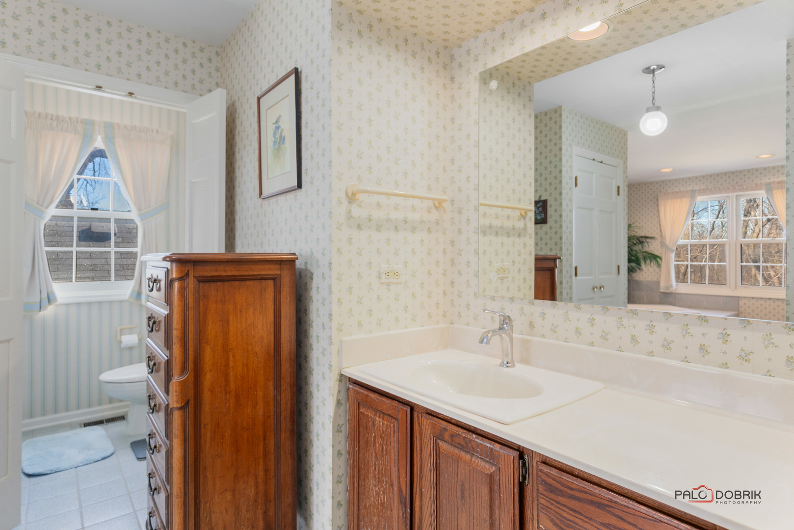 950 Old Mill Road Lake Forest, IL 60045 - Photo 28 of 59 a bathroom with a sink a toilet and shower
