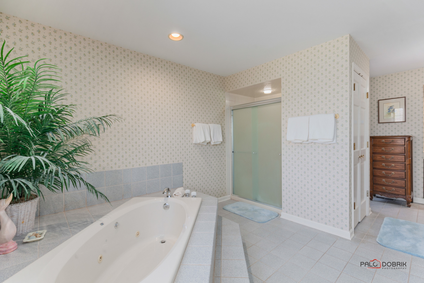 950 Old Mill Road Lake Forest, IL 60045 - Photo 30 of 59 a bathroom with a bathtub and shower