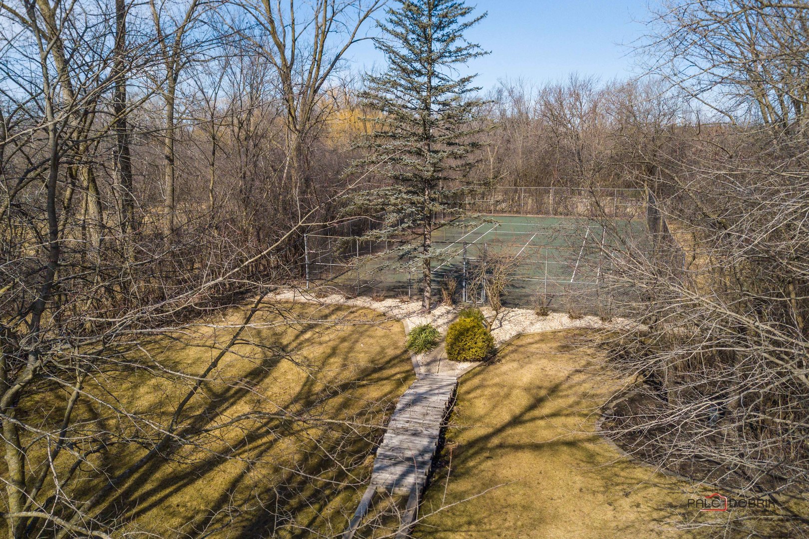 950 Old Mill Road Lake Forest, IL 60045 - Photo 39 of 59 a view of a yard with large trees