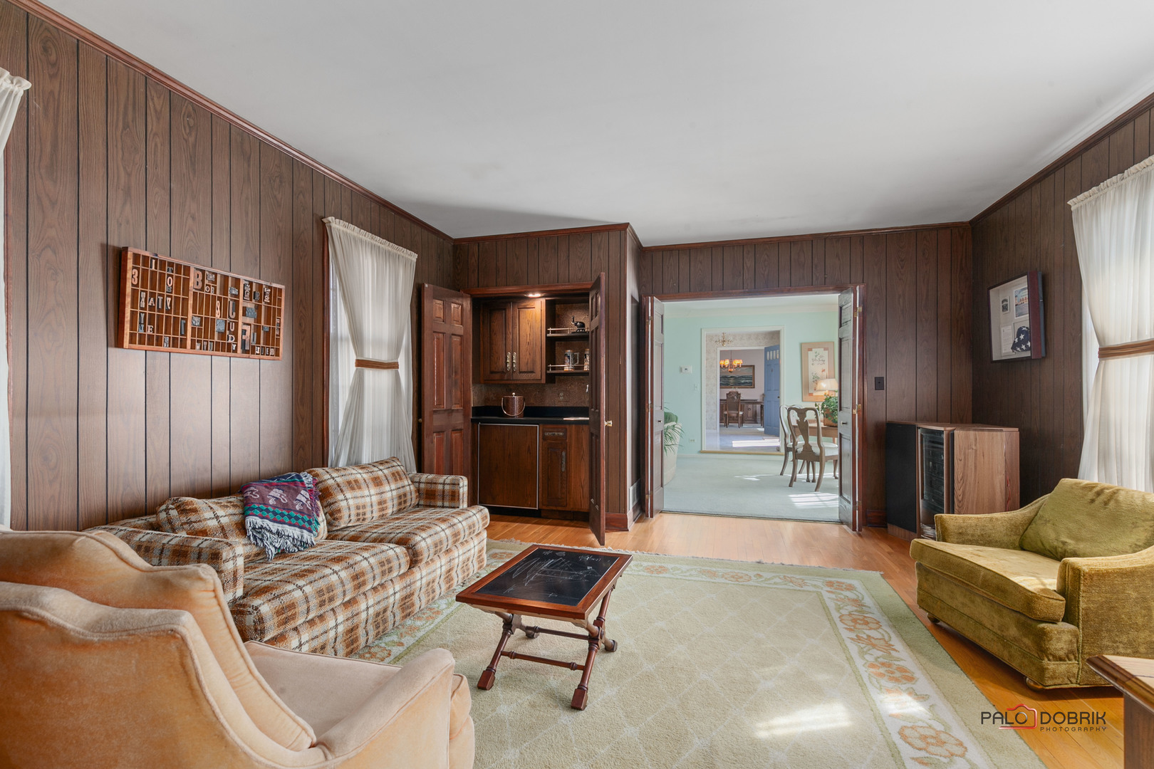 950 Old Mill Road Lake Forest, IL 60045 - Photo 7 of 59 a living room with furniture and a flat screen tv