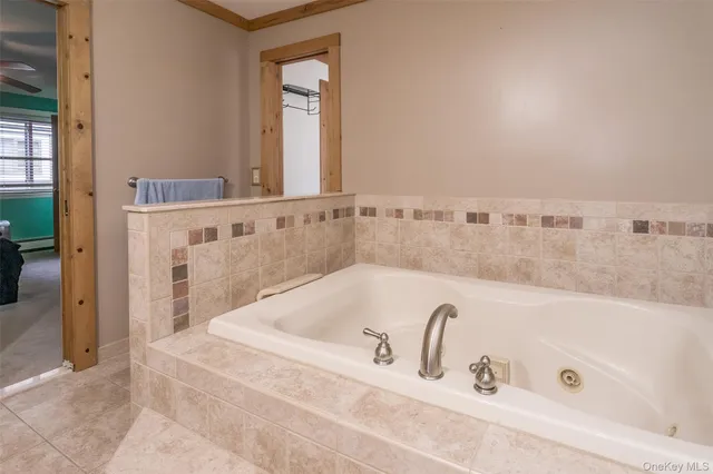a bathroom with bathtub