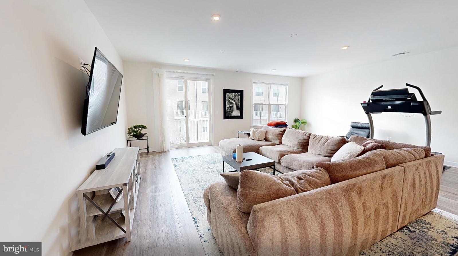 12342 Azure Lane, Unit 24 Fairfax, VA 22033 - Photo 4 of 38 Living Room w/ Balcony