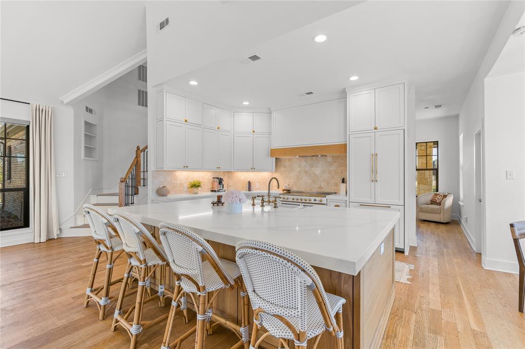990 Cornelius Road Rockwall, TX 75087 - Photo 11 of 37 a large kitchen with a table and chairs
