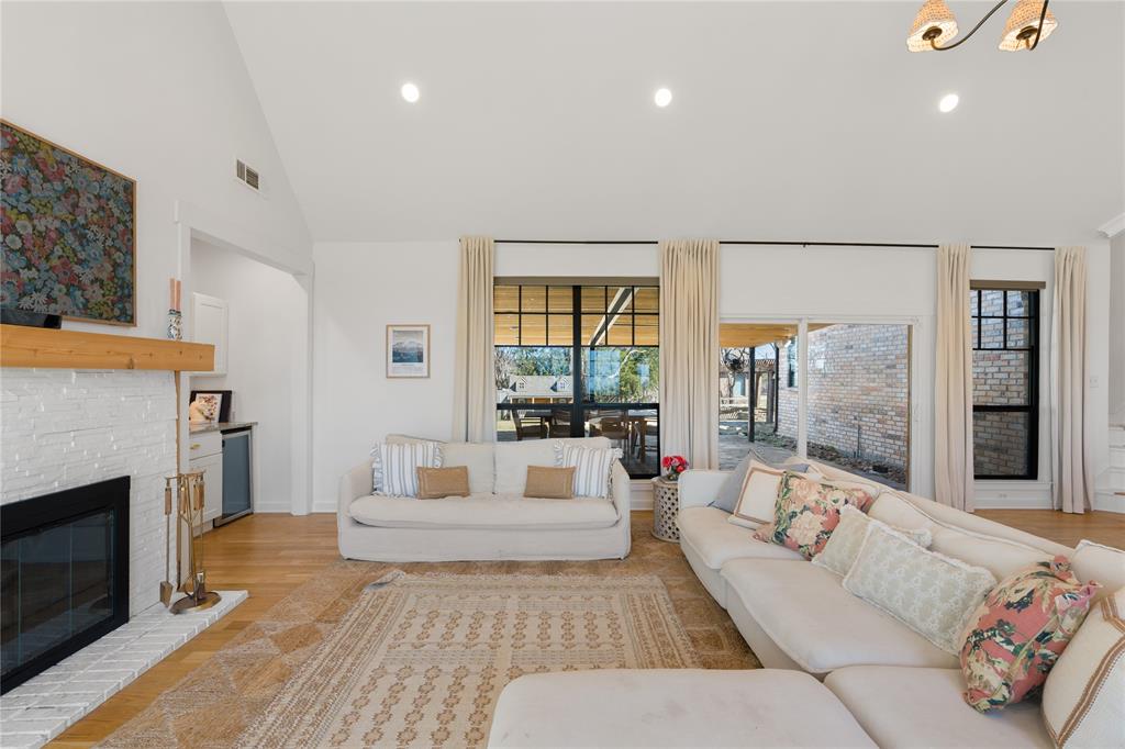 990 Cornelius Road Rockwall, TX 75087 - Photo 18 of 37 a living room with furniture and a fireplace