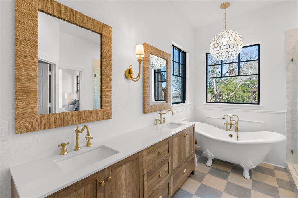 990 Cornelius Road Rockwall, TX 75087 - Photo 20 of 37 a bathroom with a double vanity sink mirror and