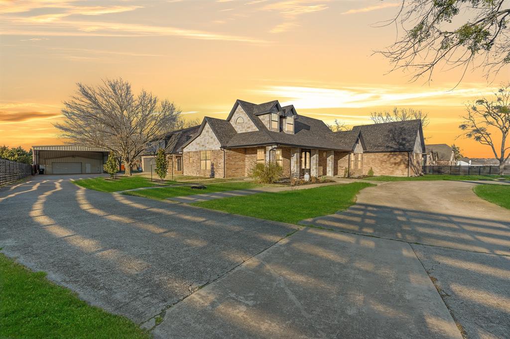 990 Cornelius Road Rockwall, TX 75087 - Photo 2 of 37 a view of a house with a yard