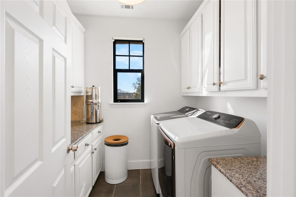 990 Cornelius Road Rockwall, TX 75087 - Photo 23 of 37 a utility room with dryer and washer