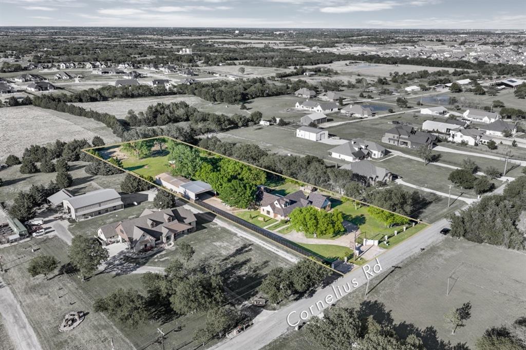 990 Cornelius Road Rockwall, TX 75087 - Photo 37 of 37 Aerial perspective of suburban area featuring property boundaries highlighted