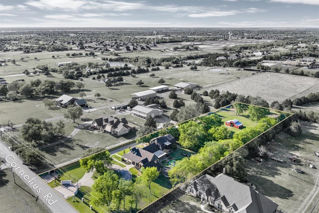 990 Cornelius Road Rockwall, TX 75087 - Photo 7 of 37 Aerial view of residential area featuring property boundaries highlighted