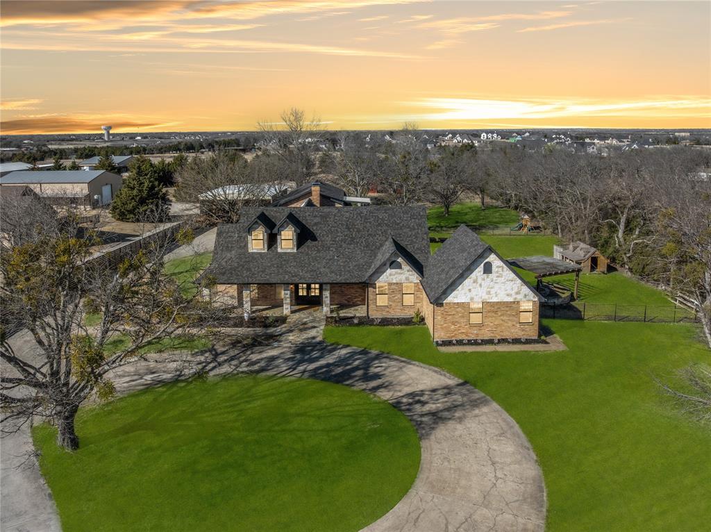 990 Cornelius Road Rockwall, TX 75087 - Photo 8 of 37 an aerial view of a house with mountain view