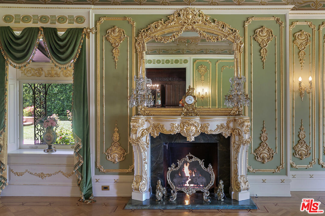 357 Lorraine Boulevard Los Angeles, CA 90020 - Photo 12 of 34 a view of a fireplace with wooden floor